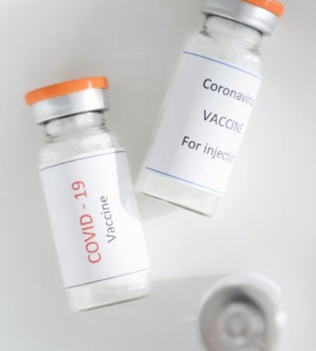 top-view-coronavirus-vaccine-bottle_23-2148755632.jpg